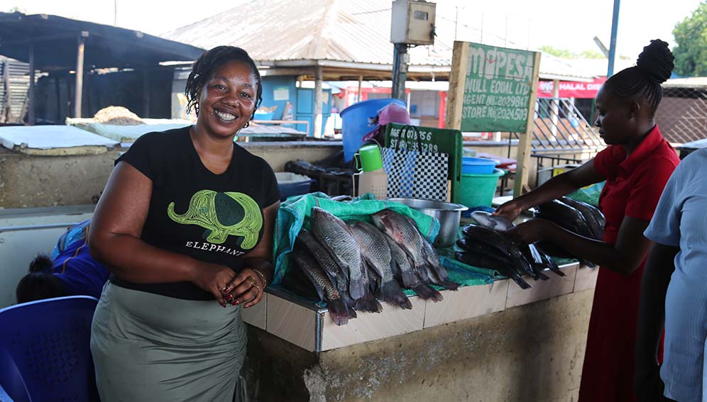 Fish monger Isabel Ogada at Dunga Beach fish market. She said her business suffered during mass fish kills on Lake Victoria, but now it stopped. Photo by Davis J. Weddi / SciDev.Net