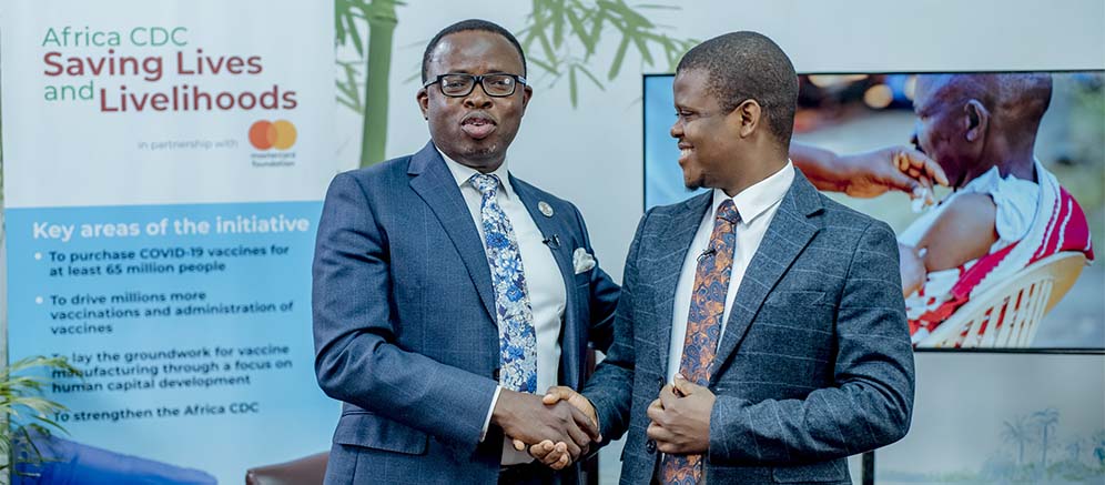 Africa CDC's Tajudeen and Paul exchanged pleasantries after their interview