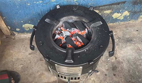 Improved cookstove ready for cooking.