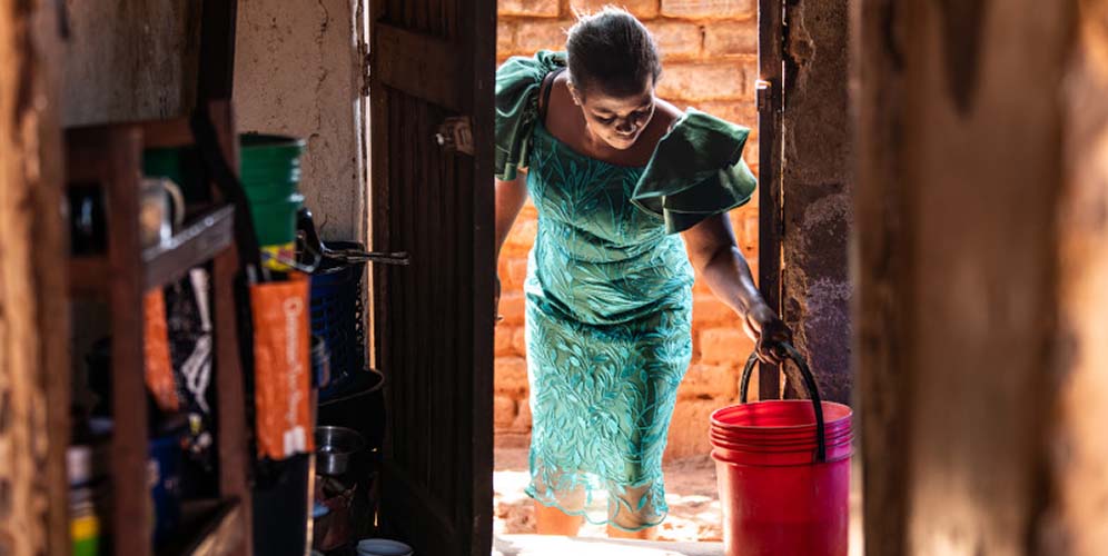 Elube, a mother of two from Lilongwe, survived cryptococcal meningitis after collapsing at home and being rushed to Kamuzu Central Hospital. Before this, she had experiences painful headaches for a long period.