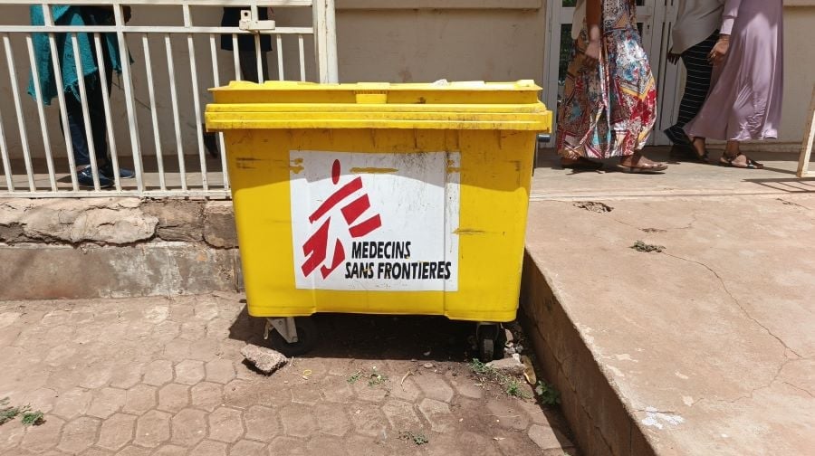 Normally, biomedical waste should be disposed of in different coloured bins depending on its type. Photo credit: SciDevNet/I.Bissuu