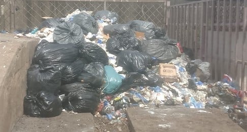 It is common to see biomedical waste mixed with household garbage, as seen here in Bangui, Central African Republic. Photo credit: SciDev.Net/AJ Mosseavo