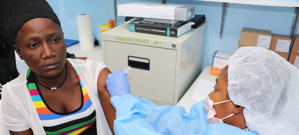 Study volunteer receives inoculation at Redemption Hospital in Monrovia on the opening day in Liberia of PREVAC, a Phase 2 Ebola vaccine trial in West Africa.