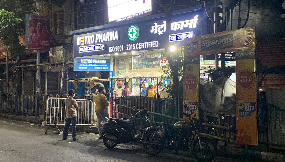 People buying medicine