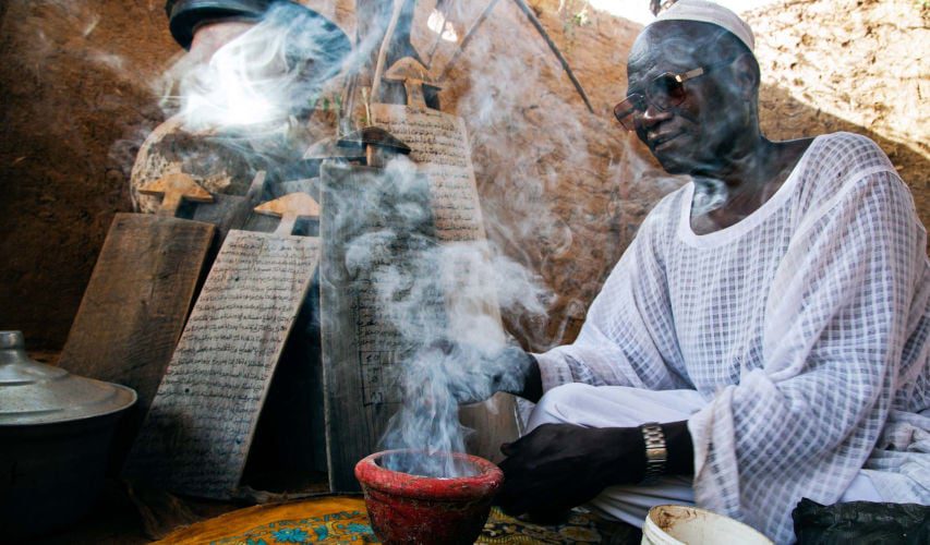 Sidig Ahmad Mohamed, prepares a treatment against mental illnesses in Al Fashir, Sudan. Photo take before current conflict.Photo by Albert Gonzalez Farran - UNAMID