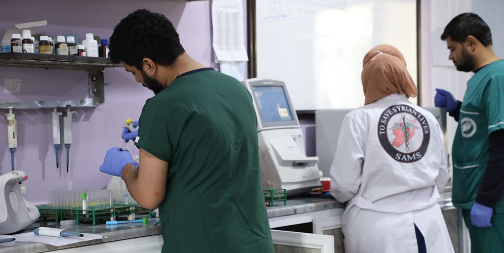 Medical staff working at Bab al-Hawa Hospital, northwest Syria before funding from the USAID-funded Syrian American Medical Society was withdrawn.| Story: loss of USAID funding is putting millions of lives at risk around the world