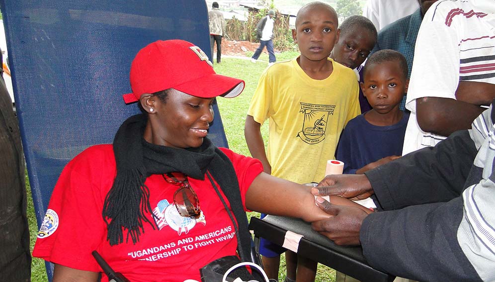 Voluntarily testing for HIV is key in the on-going fight against AIDS The U.S. Mission in Uganda is once again sponsoring a series of World AIDS Day events from November 17 to December 18 across Uganda. All Ugandans are invited to participate. These large community events will include a quiz show with the theme “Everybody wins when we know the facts about HIV and AIDS.” The events are part of the U.S. Mission’s ongoing commitment to working in partnership with Ugandans to defeat HIV and AIDS. Photo courtesy of U.S. Mission Uganda.| Story: loss of USAID funding is putting millions of lives at risk around the world