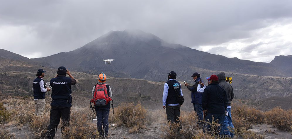 A team at the Geological, Mining and Metallurgical Institute monitors the eruption of the Ubinas volcano, Peru, in July 2019. Credit: Jersy Marino | Story: loss of USAID funding is putting millions of lives at risk around the world