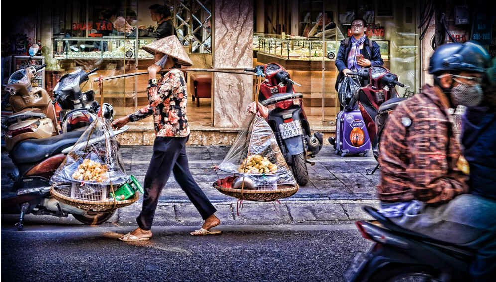 Vending food on the streets of Hanoi, Vietnam.